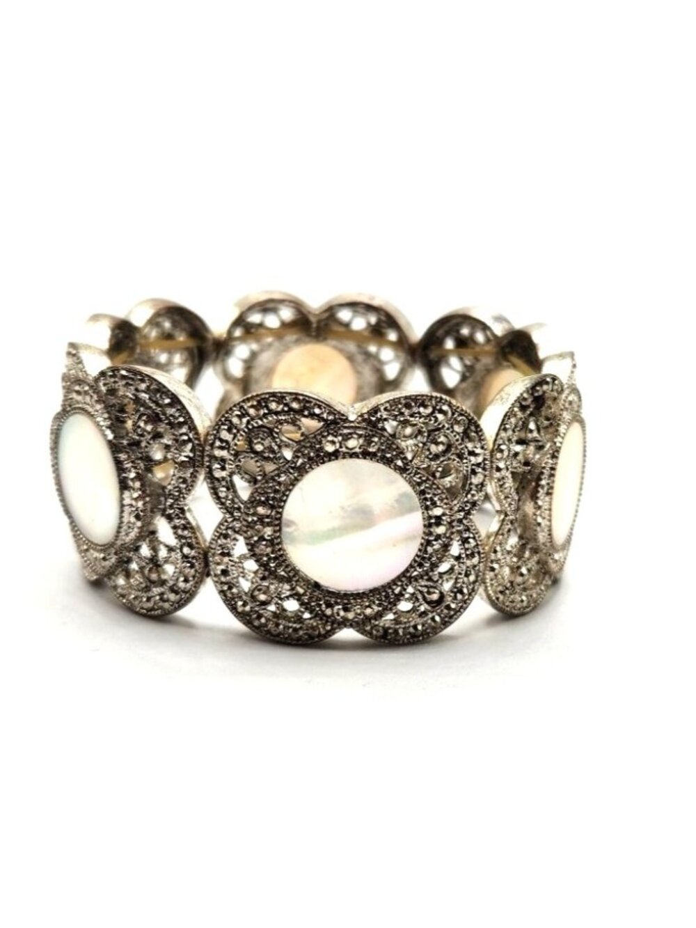 Silver Tone Filagree Stretch Bracelet With White Iridescent Stone Accent